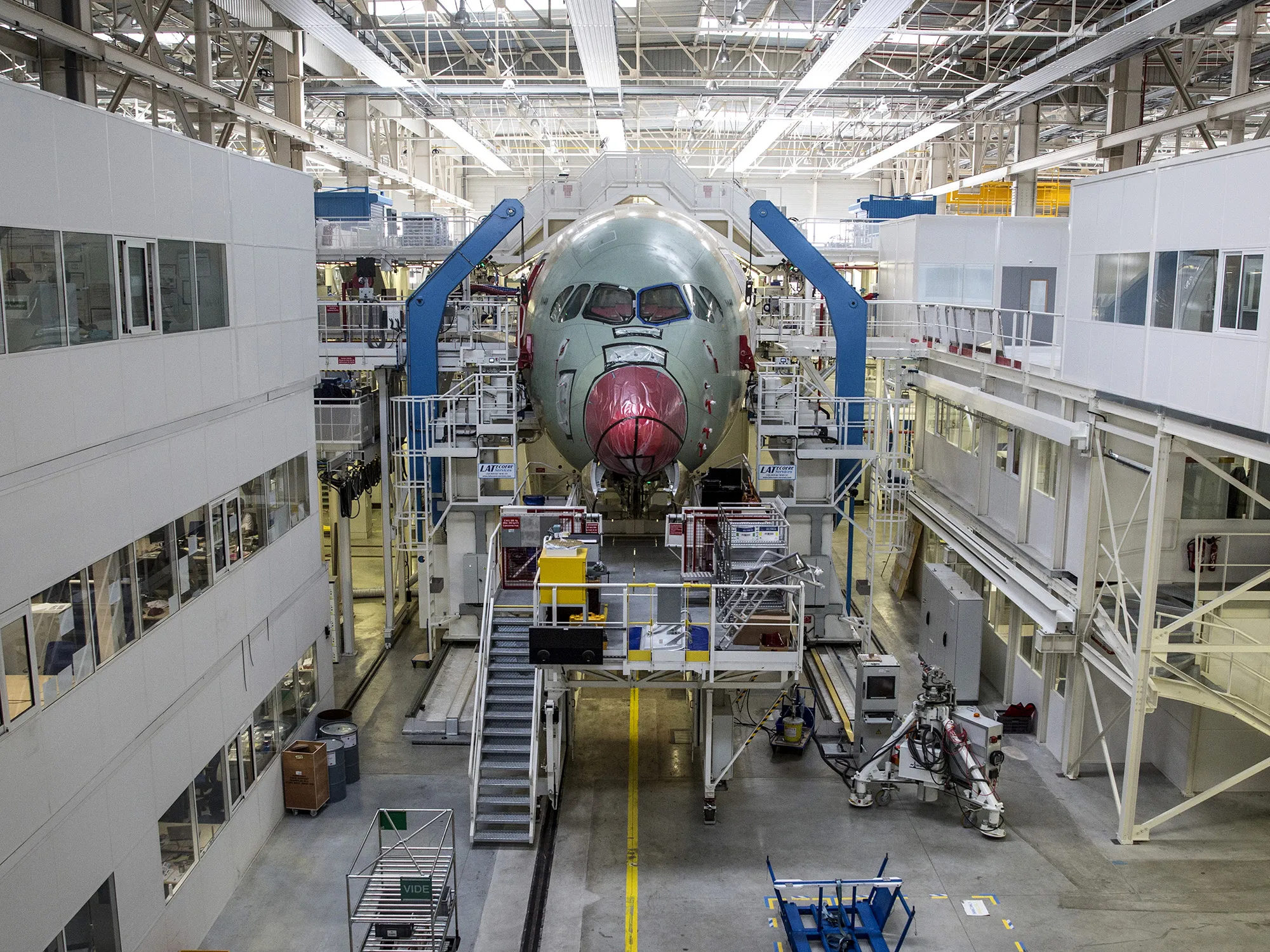 An Airbus A350 XWB passenger aircraft stands on the final assembly line at the Airbus factory in Toulouse, France.