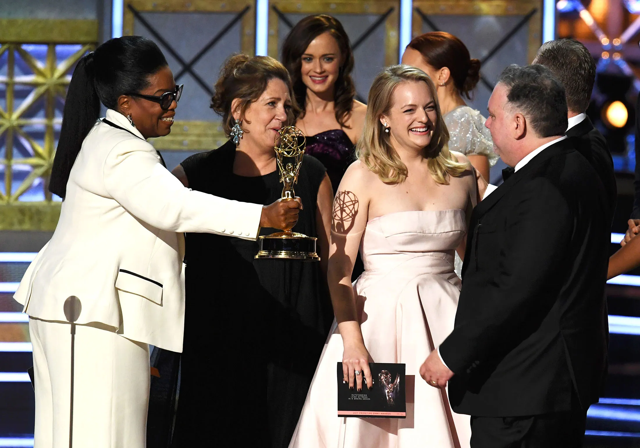 The cast and crew of 'The Handmaid's Tale' accept the Outstanding Drama Series award during the 69th Annual Primetime Emmy Awards on Sept. 17.
