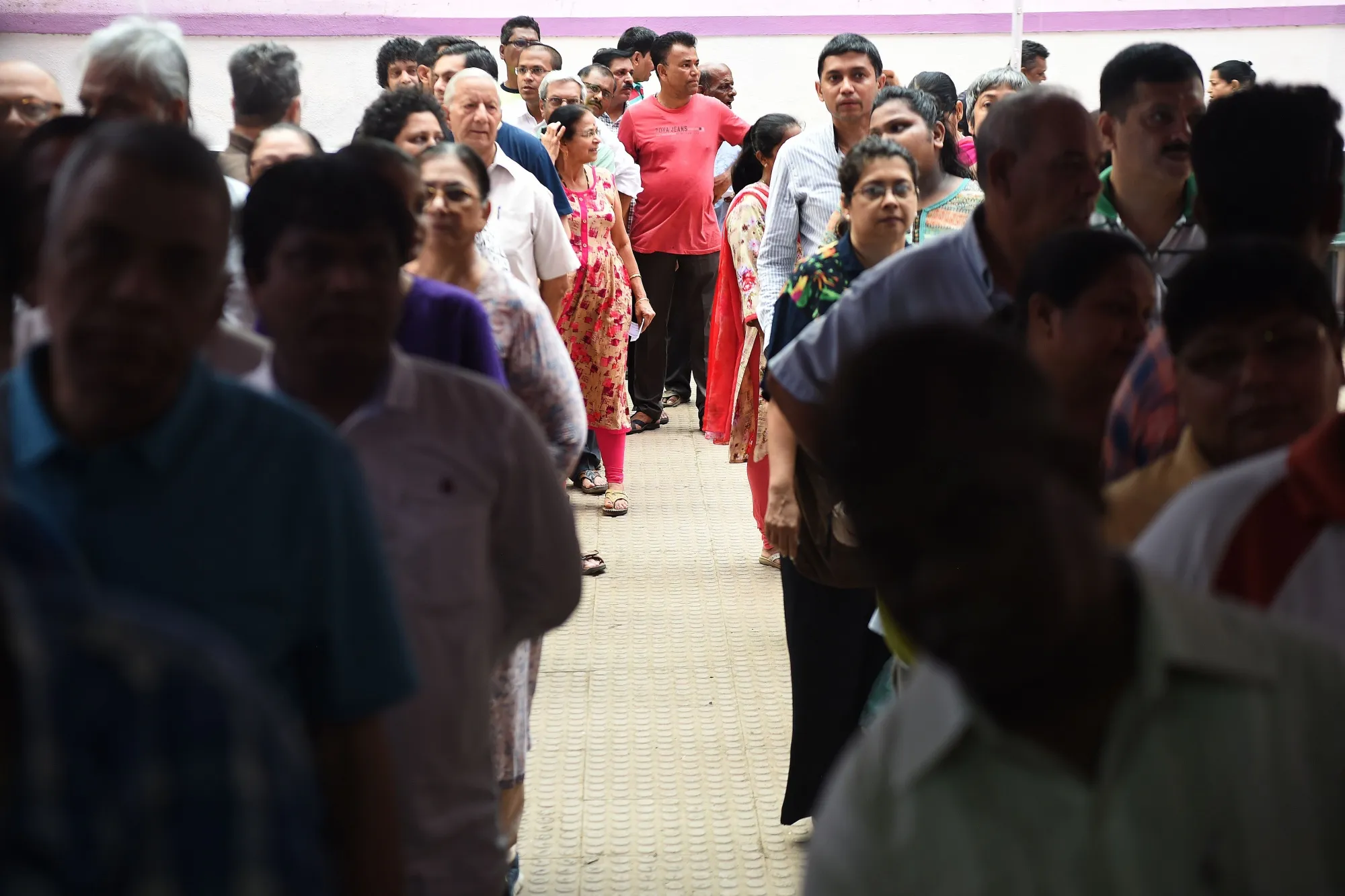 Voters at a polling station in Mumbai in 2019.