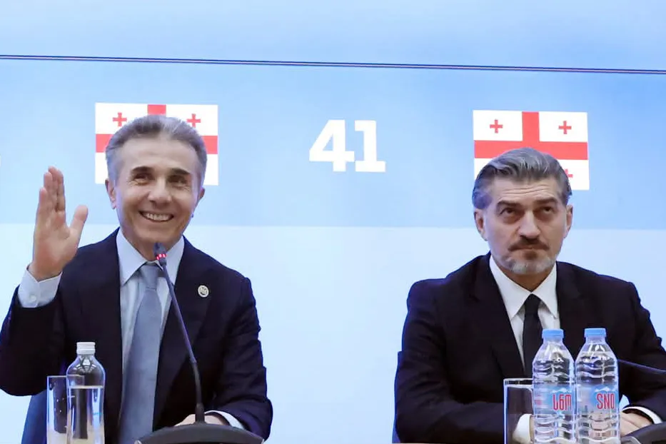 Billionaire Bidzina Ivanishvili, left, and Mikheil Kavelashvili.