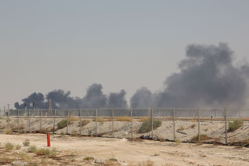 Smoke billows from an Aramco oil facility in Abqaiq on Sept. 14.