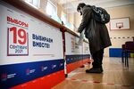 A woman votes&nbsp;during the second day of the three-day parliamentary and local elections in Moscow on Sept. 18.