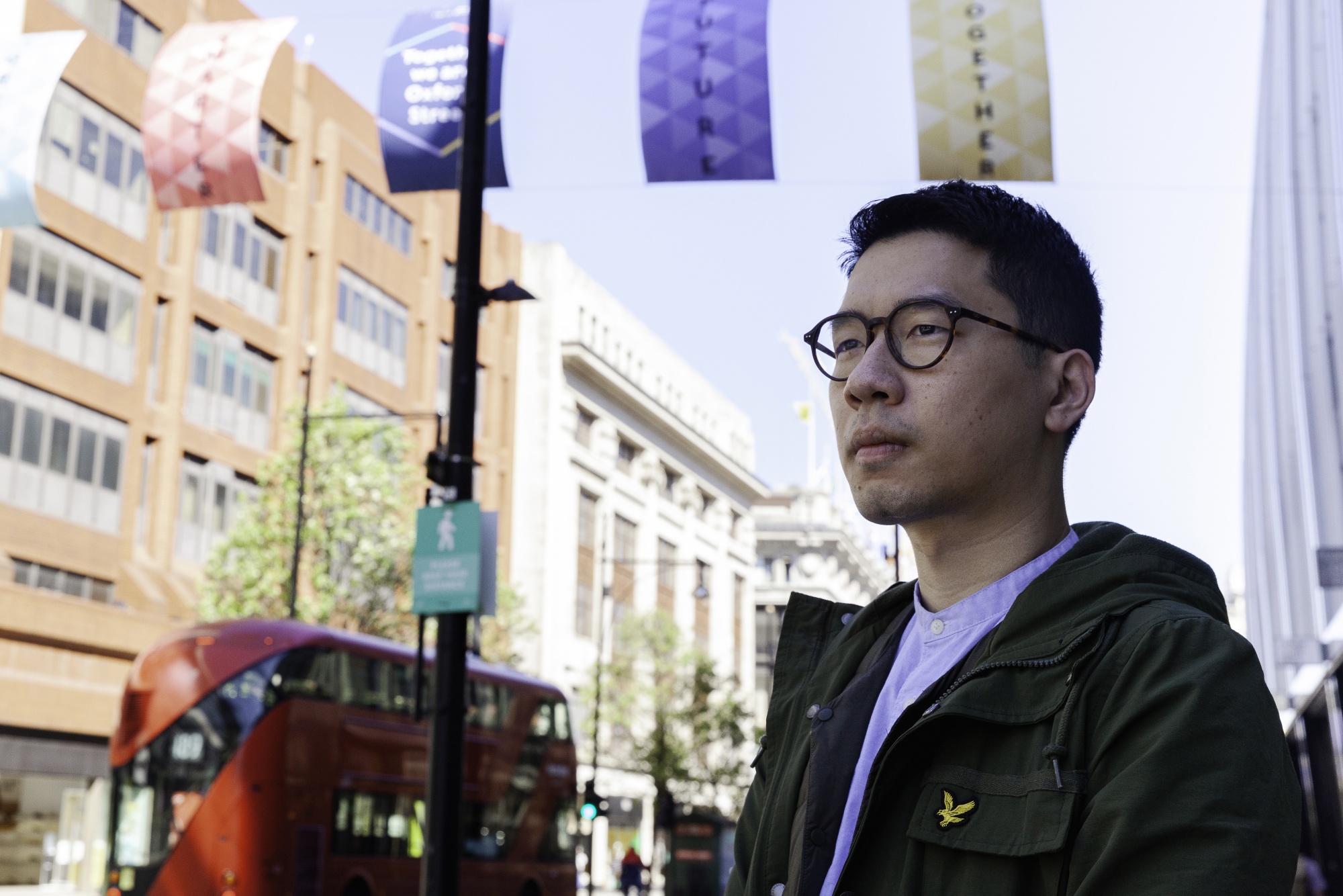 Exiled Hong Kong Activist Nathan Law Says BN(O) Flight to UK Will Continue Bloomberg