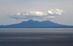 This picture taken on October 10, 2018 shows Kunashiri island, part of an archipelago under Russian control, as seen from the Rausu Kunashiri Observatory Deck in Rausu, Hokkaido prefecture. 