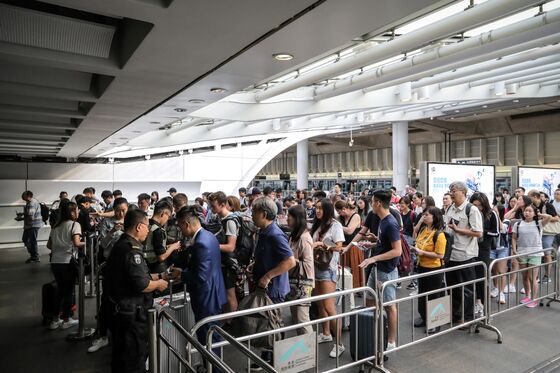 Hong Kong Labor Group Changes Protest Location After Police Ban