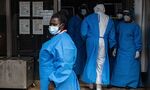 Medical staff members of an&nbsp;Ebola Treatment Unit at a hospital in Uganda on Sept. 24.
