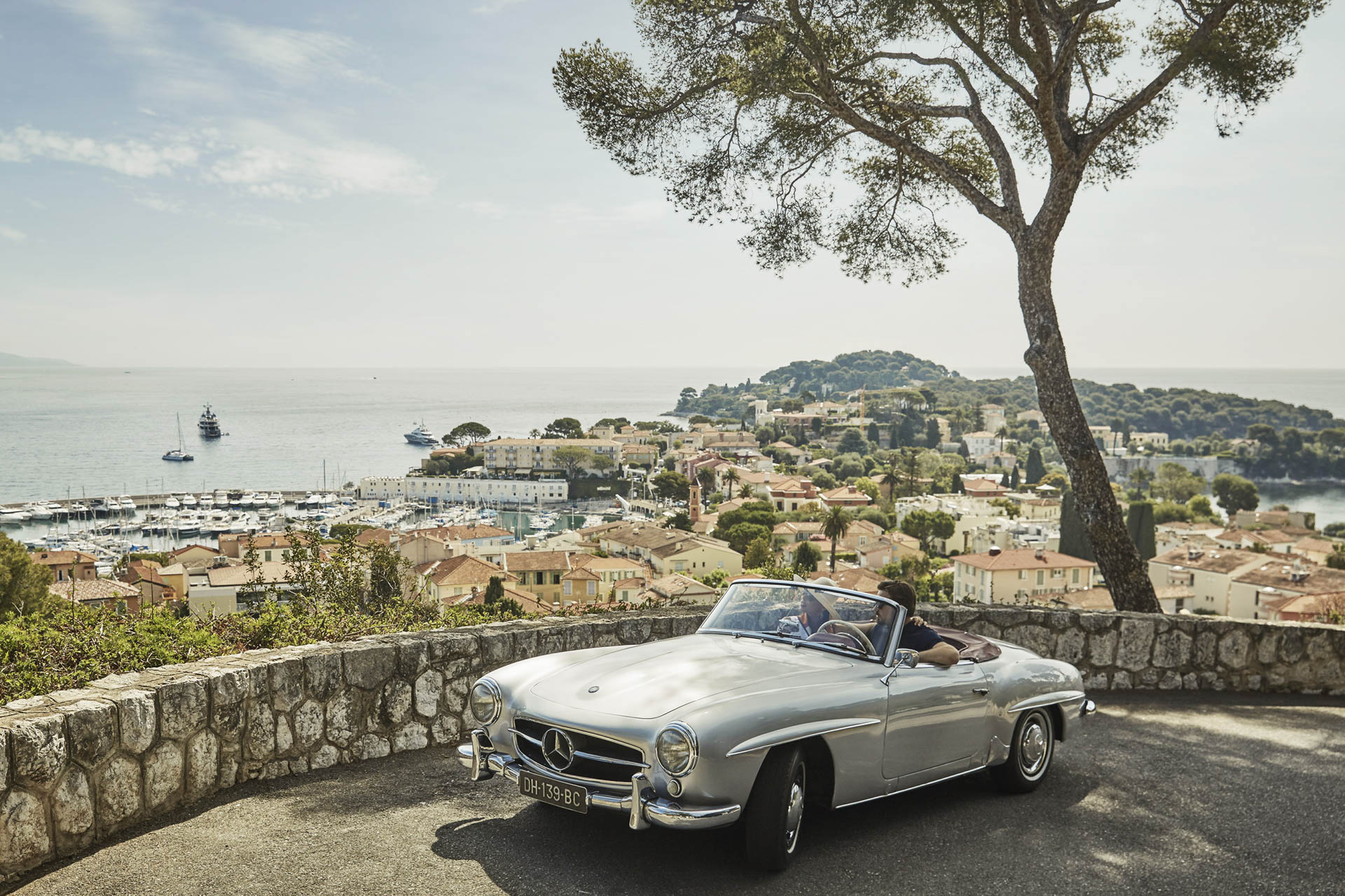 One option: Instead of buying a Mercedes SL 140 Cabriolet, rent one and drive it along the Mediterranean coast.
