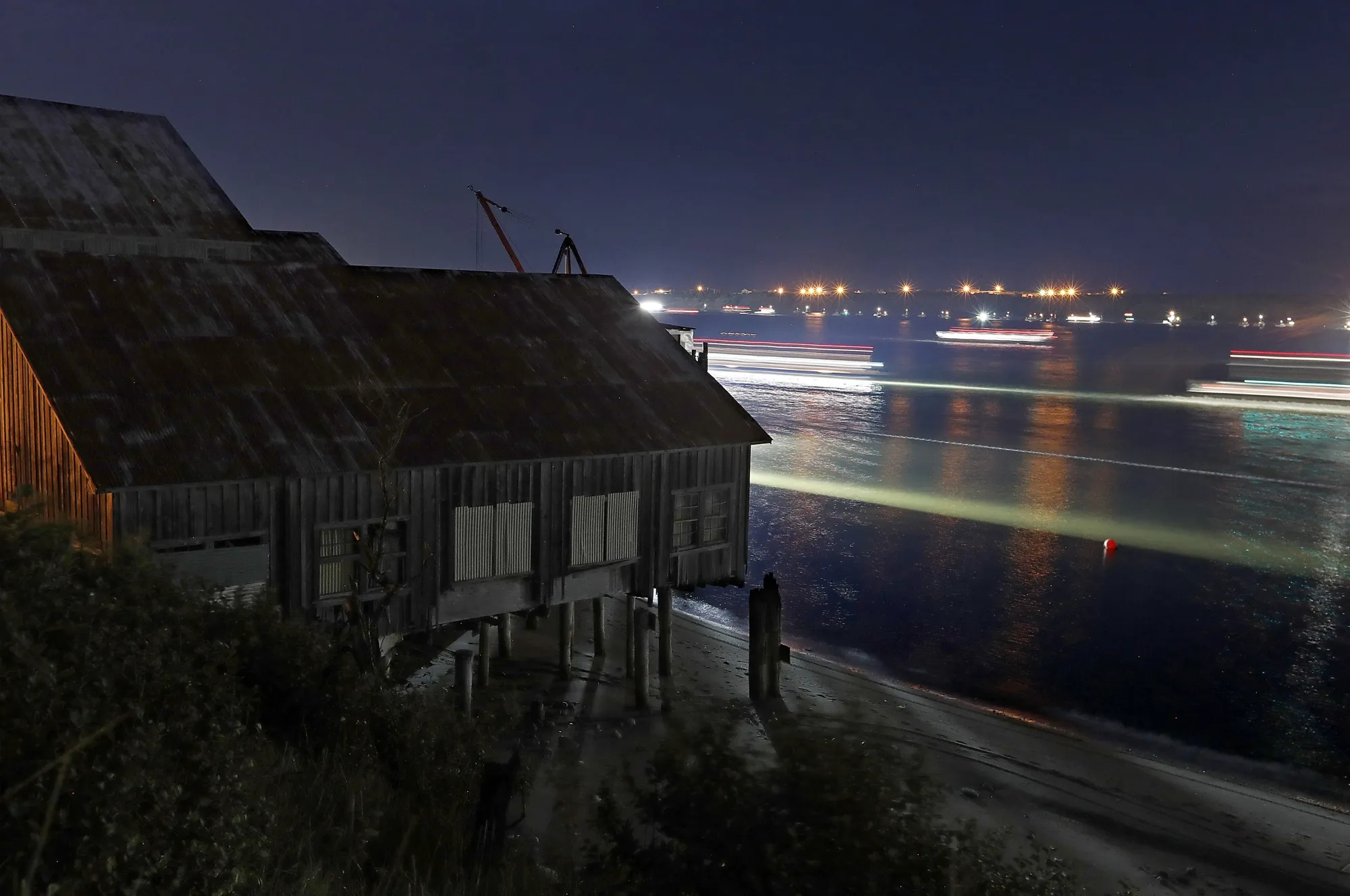 The lights of commercial fishing boats on the Naknek River in Bristol Bay, Alaska.