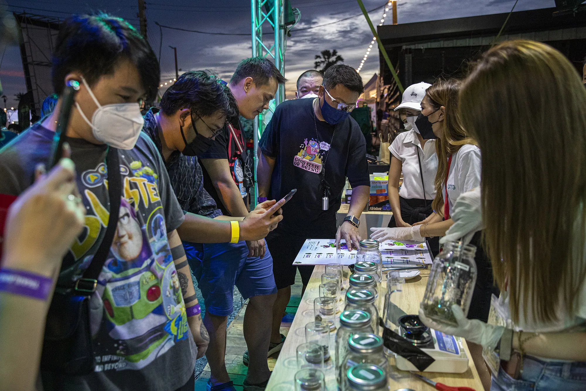 People browse strains of marijuana on in Nakhon Pathom, Thailand.