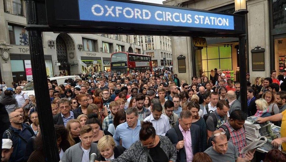 Union members gather outside Paddington Station on Wednesday as they start a 24-hour strike of the London Underground.