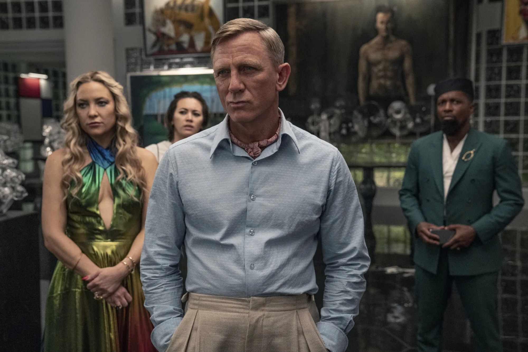 Kate Hudson, from left, Jessica Henwick, Daniel Craig and Leslie Odom Jr. in a scene from “Glass Onion: A Knives Out Mystery”