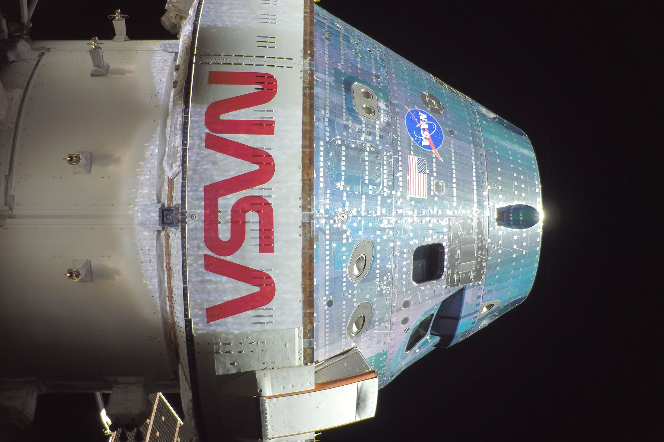 Orion snapped this high-resolution selfie in space with a camera mounted on one of its solar array wings during a routine external inspection of the spacecraft on the second day into the Artemis II mission on April 3, 2026. Source: NASA