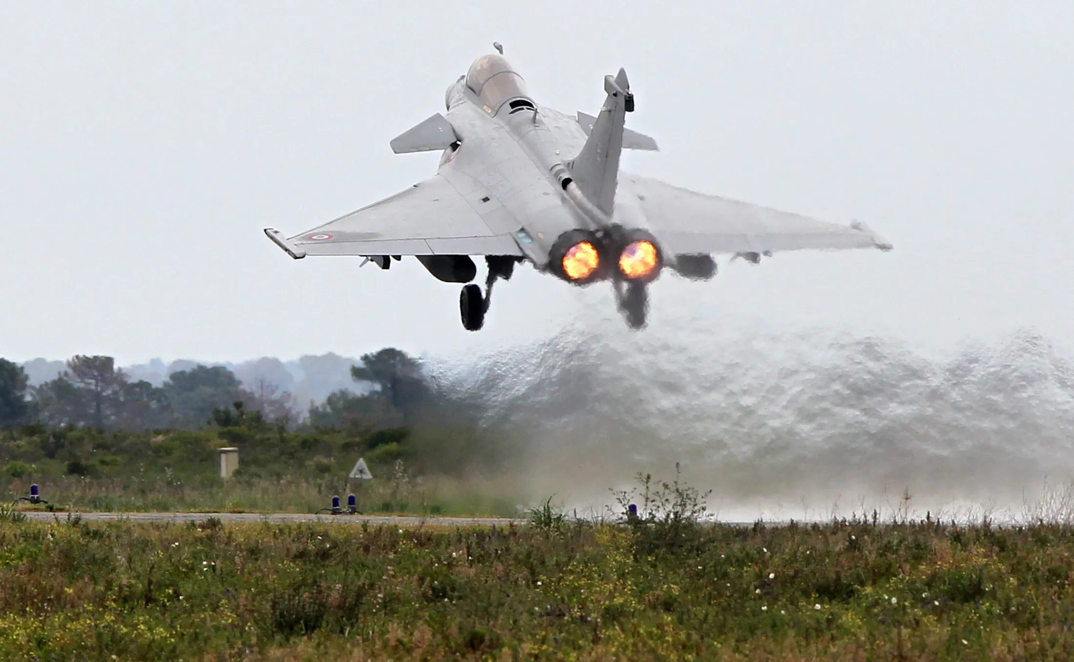 A fighter jet takes off during a military drill of the "Serpentex" air forces with the participation of 12 Nations including 10 from NATO&nbsp;at&nbsp;the military air base of Solenzara on the French Mediterranean island of Corsica.&nbsp;