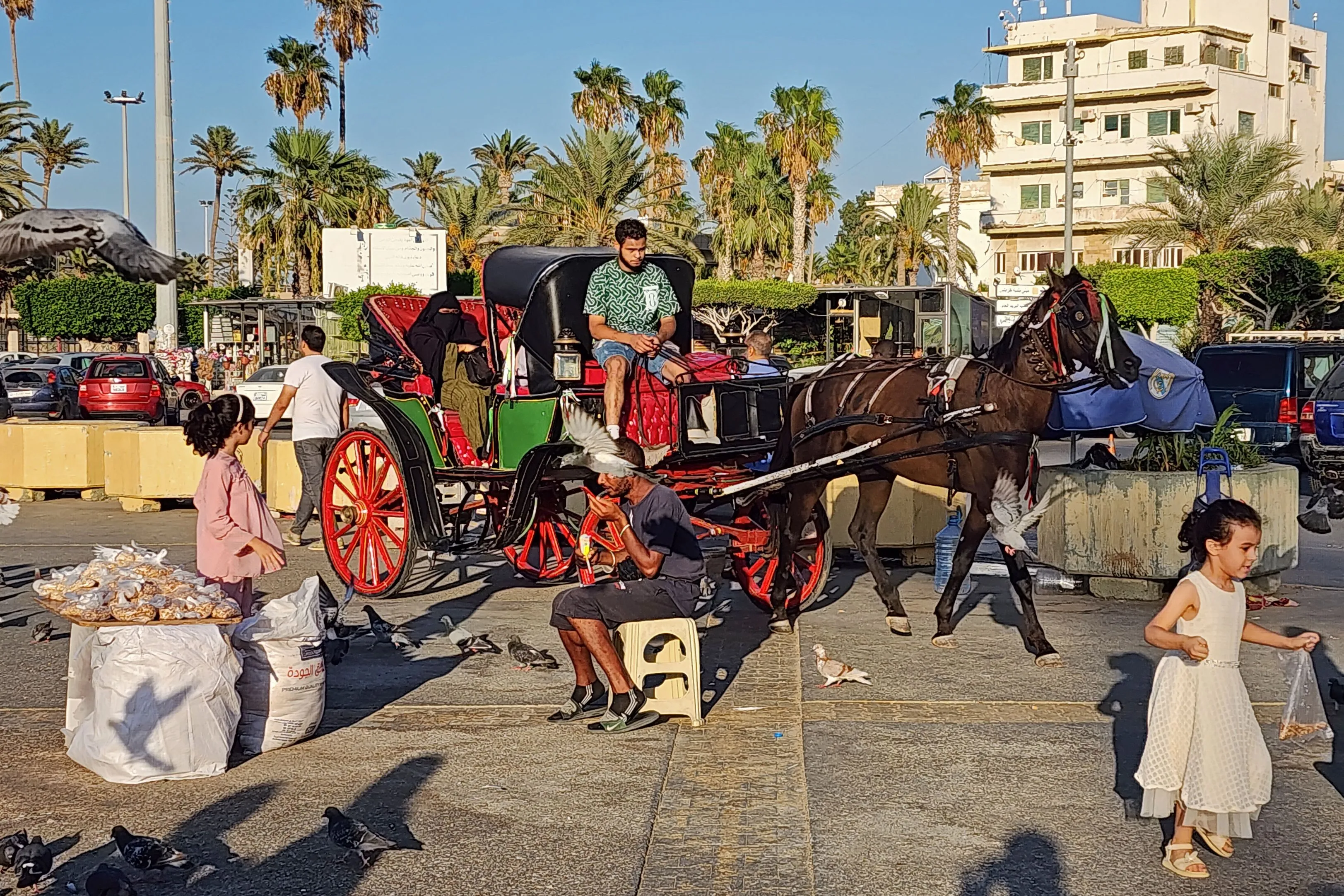 Libyans gather at the Martyrs' Square in Tripoli on Aug. 17.