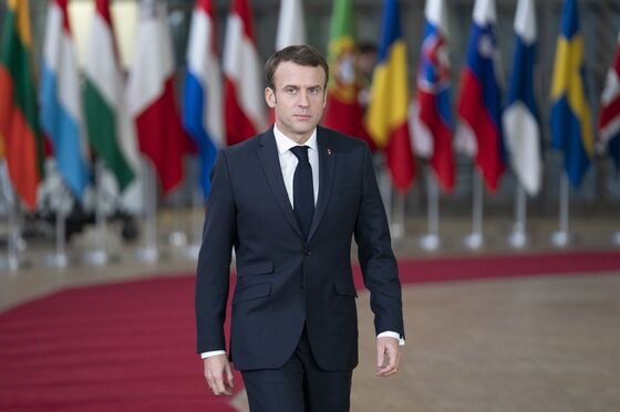 Macron's Fish Fight Offers May a Glimpse of Brexit Battles Ahead