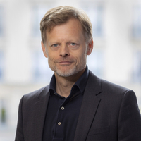 Stylized headshot in Bloomberg office of Andreas Kluth