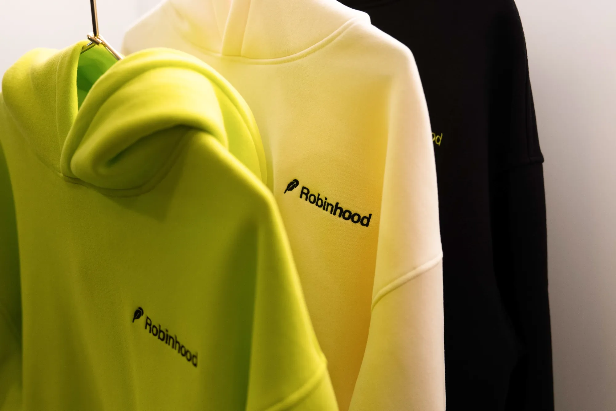Robinhood Market hooded sweatshirts displayed during a media event at John F. Kennedy International Airport (JFK) in New York, US, on Wednesday,