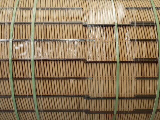 A completed copper coil before it's placed on a steel core of a transformer.