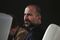Dara Khosrowshahi, chief executive officer of Expedia Inc., listens during the GeekWire Summit in Seattle, Washington, U.S., on Tuesday, Oct. 4, 2016. The summit is one of the country's premier technology conferences, bringing together more than 800 innovators, entrepreneurs, business executives and tech leaders to explore the future of the innovation economy. Photographer: David Ryder/Bloomberg
