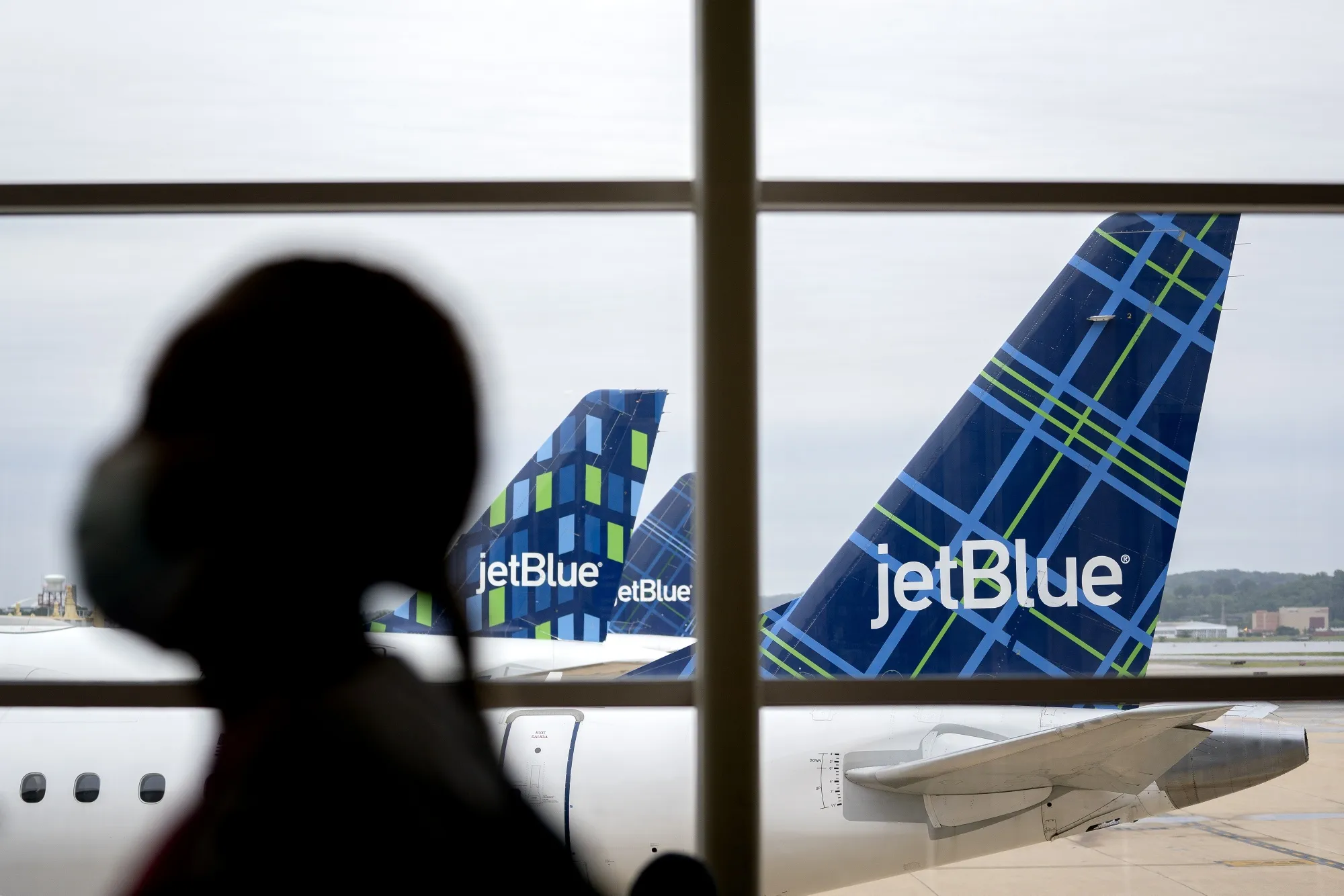 JetBlue Airways Corp. aircraft at Ronald Reagan National Airport&nbsp;in Arlington, Virginia.