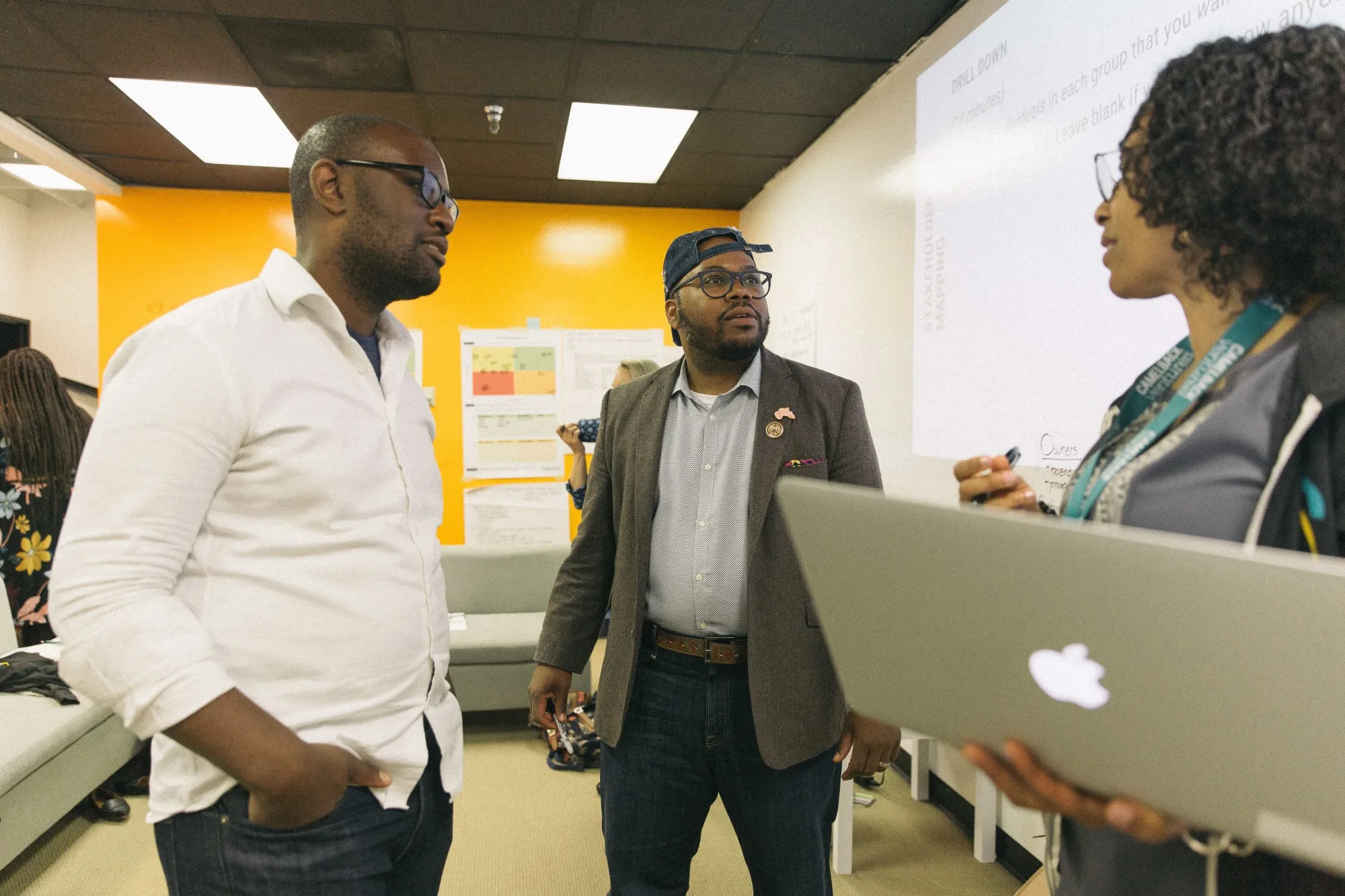 Aaron Walker (left), founder of New Orleans’ Camelback Ventures, with 2018 Camelback Fellows Myron Long of Social Justice School and Janine Gomez of I Dream Public Charter School.