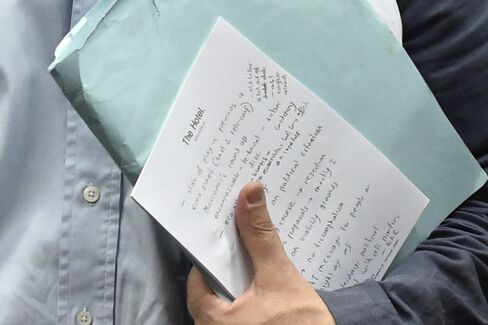 The handwritten notes of newly appointed Greek Finance Minister Euclid Tsakalotos during a Eurogroup meeting ahead of a Eurozone Summit meeting at EU headquarters in Brussels on July 7, 2015.