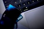 Visa cards arranged in New York, US, on Thursday, Sept. 26, 2024. The US Justice Department sued Visa Inc., alleging the global payments giant illegally monopolized the debit card market, in the Biden administration’s first major antitrust case in the financial services industry.