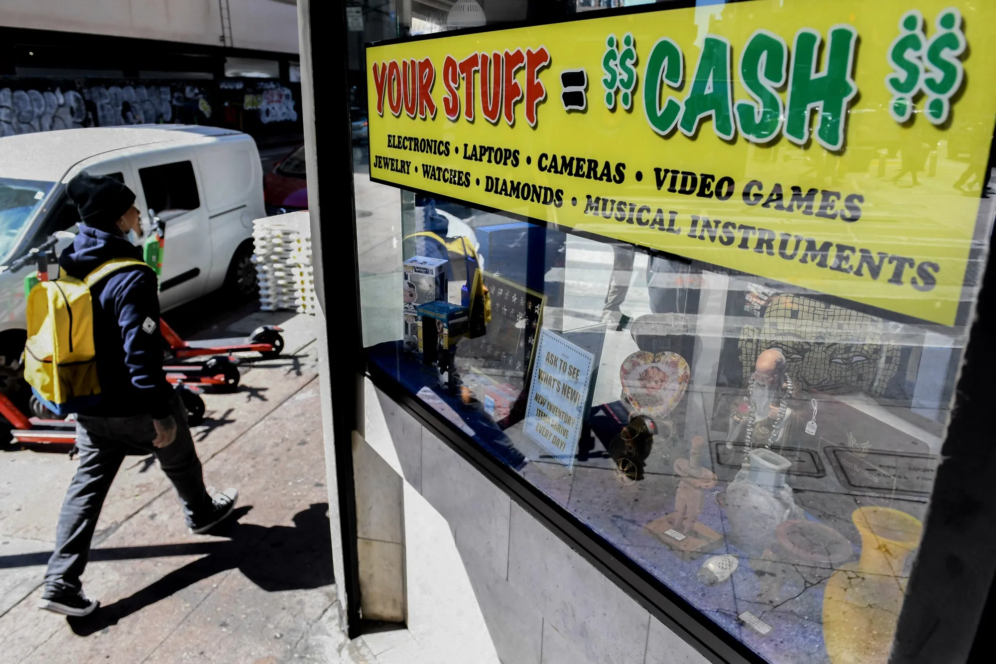 Signage offering cash for valuables outside of a pawn shop&nbsp;in downtown Los Angeles.
