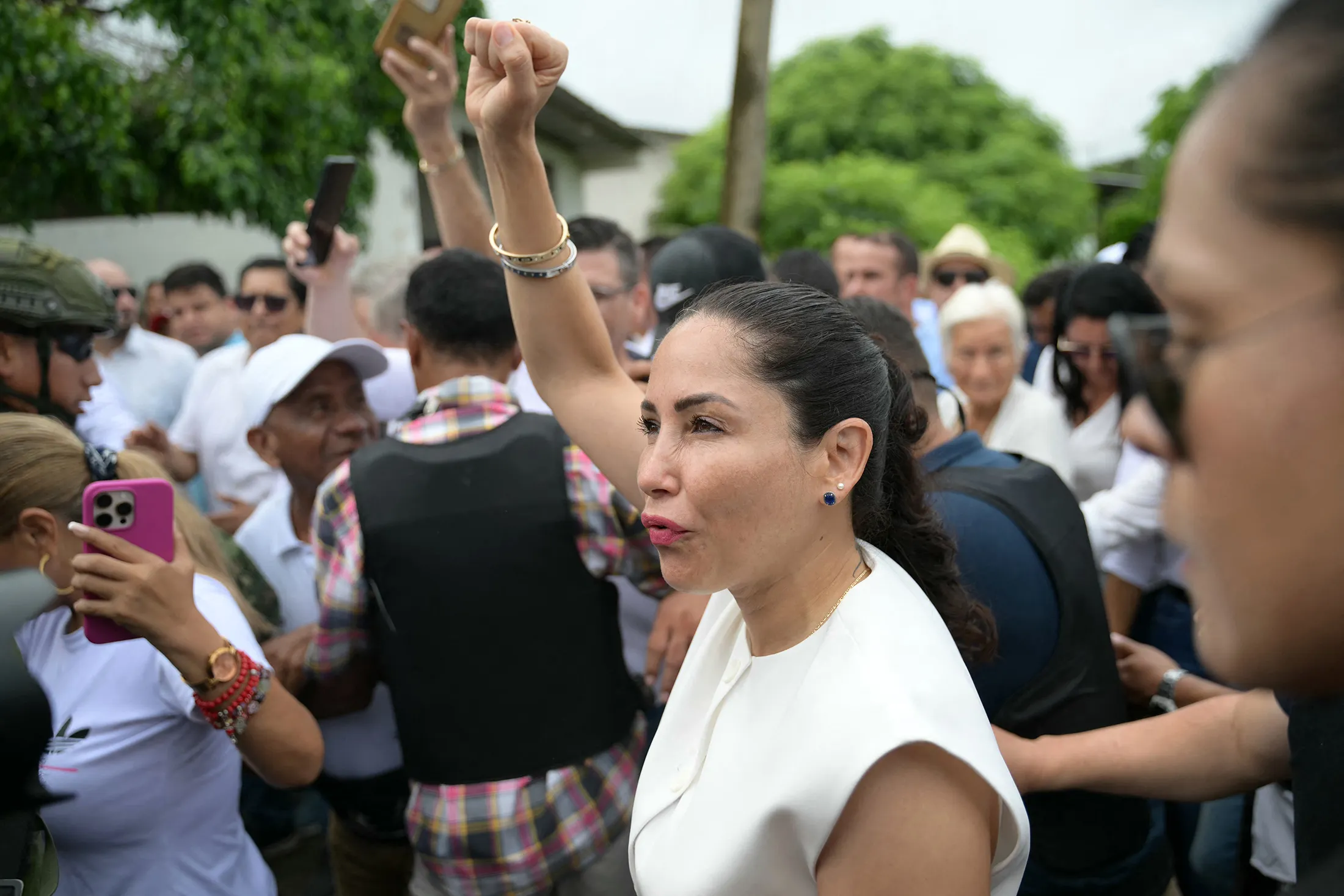 Luisa Gonzalez departs after voting at a polling station in Canuto, Ecuador, on Feb. 9.