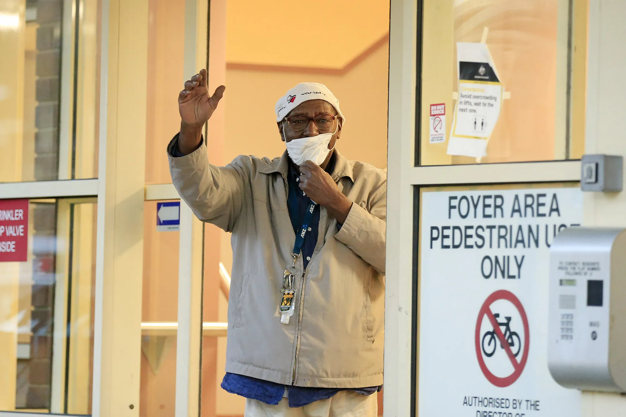 A resident leaves a housing complex in Melbourne after the easing of lockdown restrictions, on July 9.