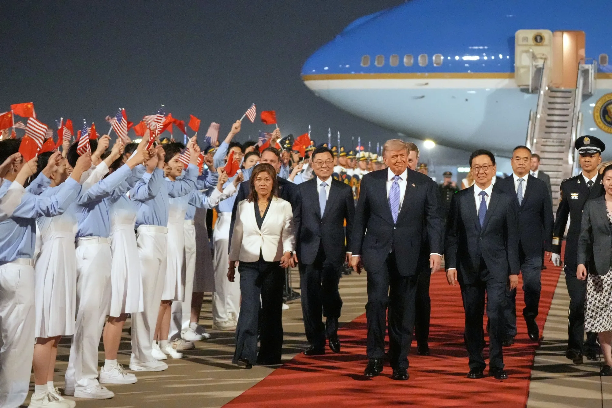 President Donald Trump walks with Chinese Vice President Han Zheng during a welcome ceremony at Beijing Capital International Airport on May 13.