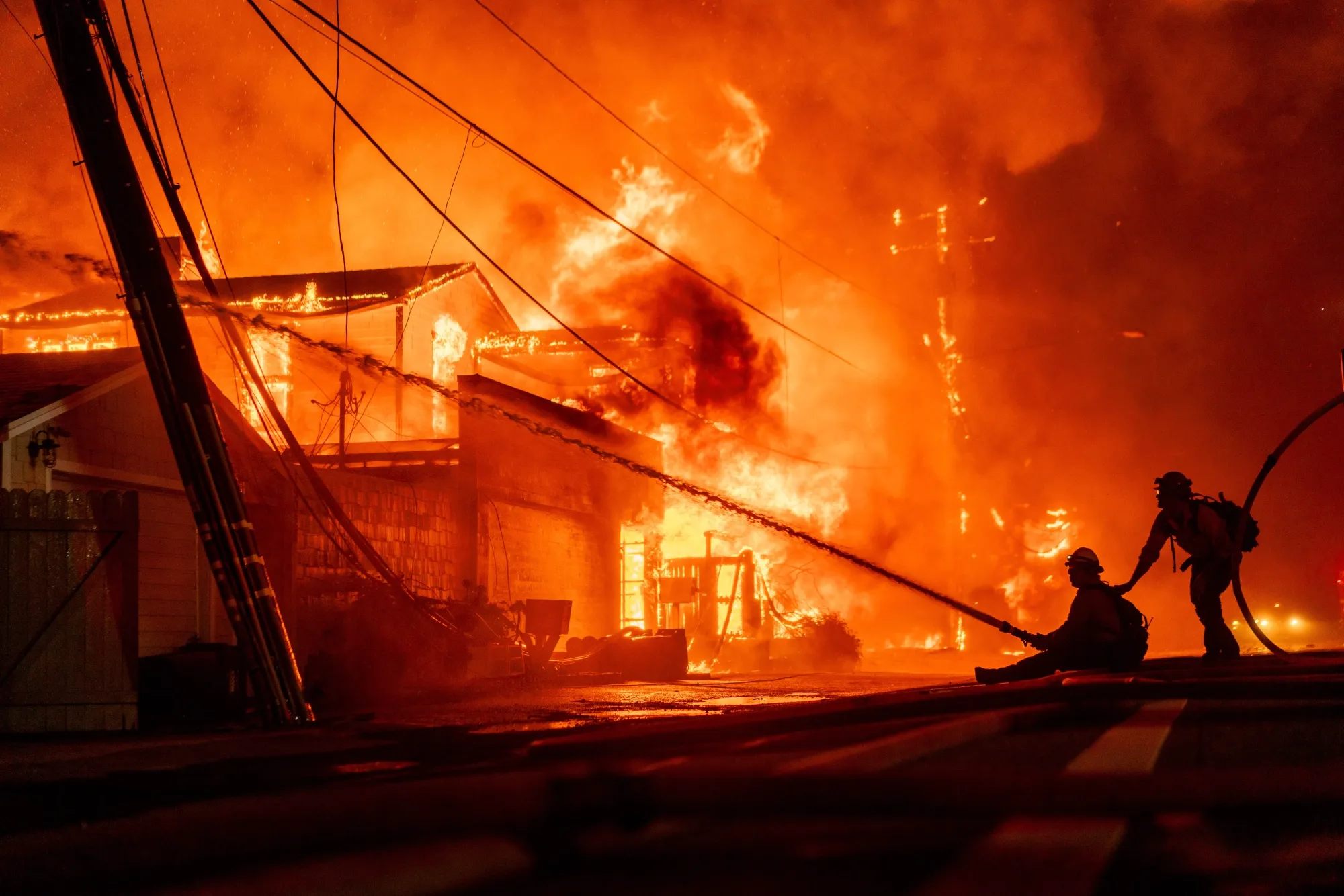 Firefighters battle flames during the Palisades Fire in the Pacific Palisades neighborhood of Los Angeles, California, US, on Tuesday, Jan. 7, 2025.&nbsp;