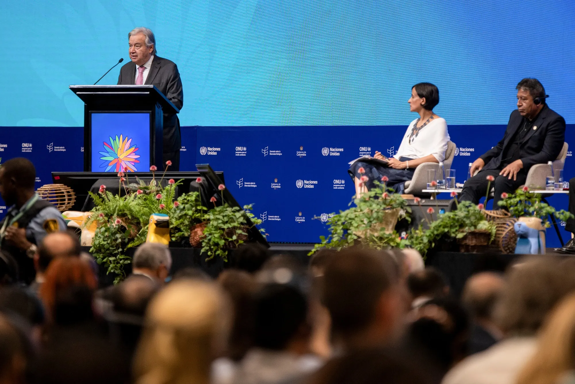 António Guterres, secretary-general of the United Nations,&nbsp;speaks during the United Nations Biodiversity Conference (COP16) in Cali,&nbsp;Colombia, on Oct. 29, as&nbsp;COP16&nbsp;President Susana Muhamad and David Choquehuanca, vice president of Bolivia, look on.&nbsp;