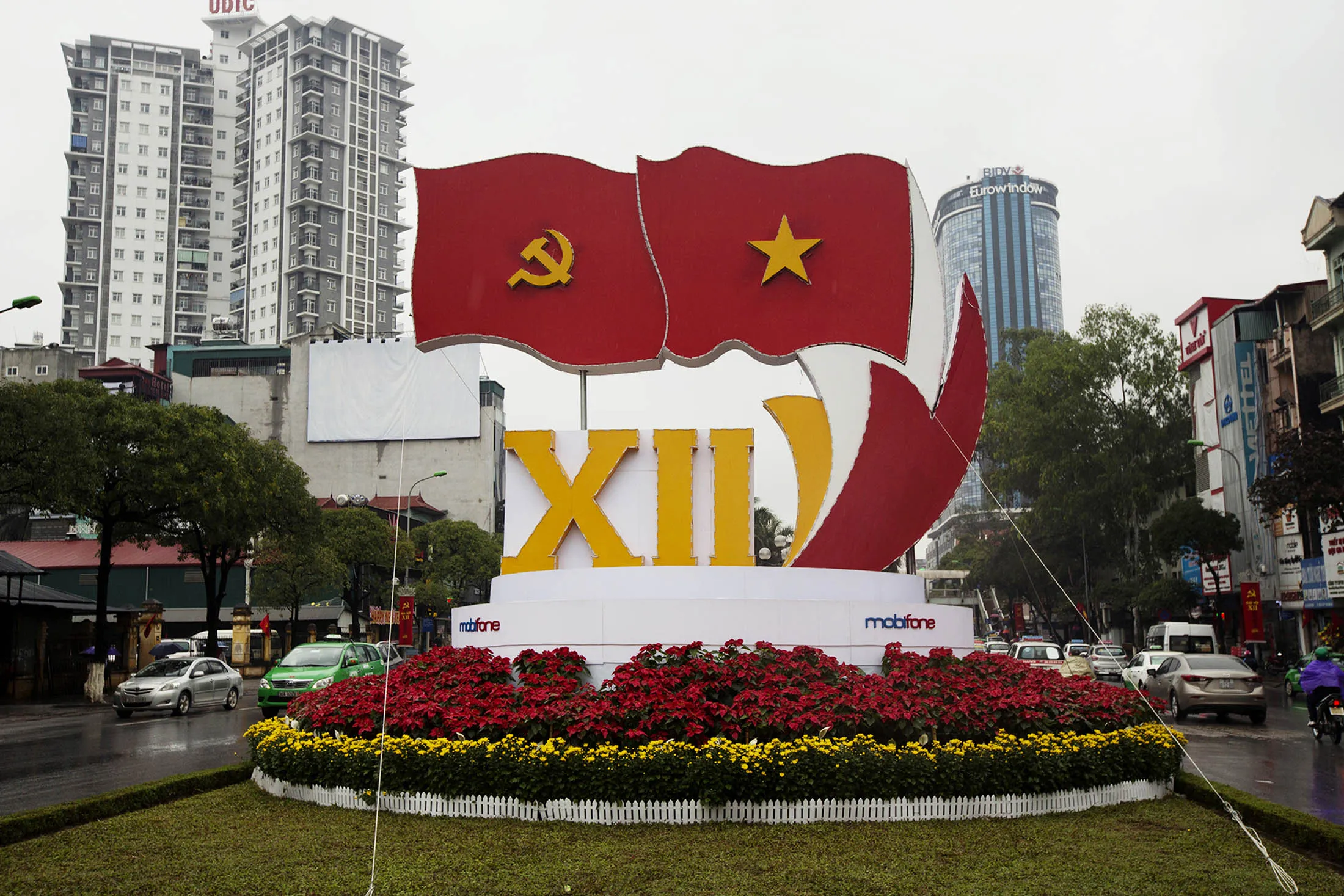 A display advertising the 12th National Congress of the Communist Party of Vietnam stands in Hanoi.
