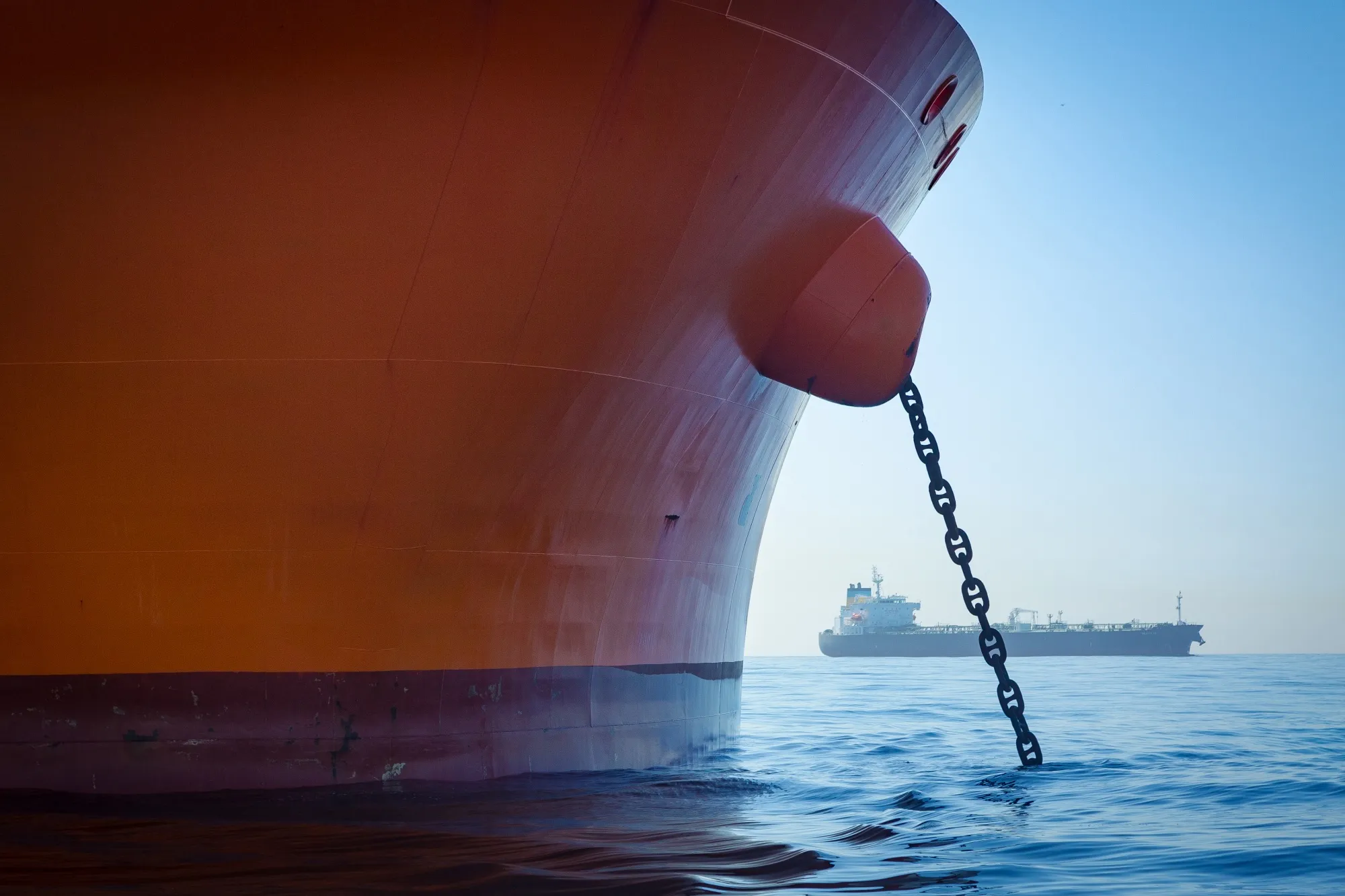Oil tankers sit anchored off the coast of Long Beach, California.