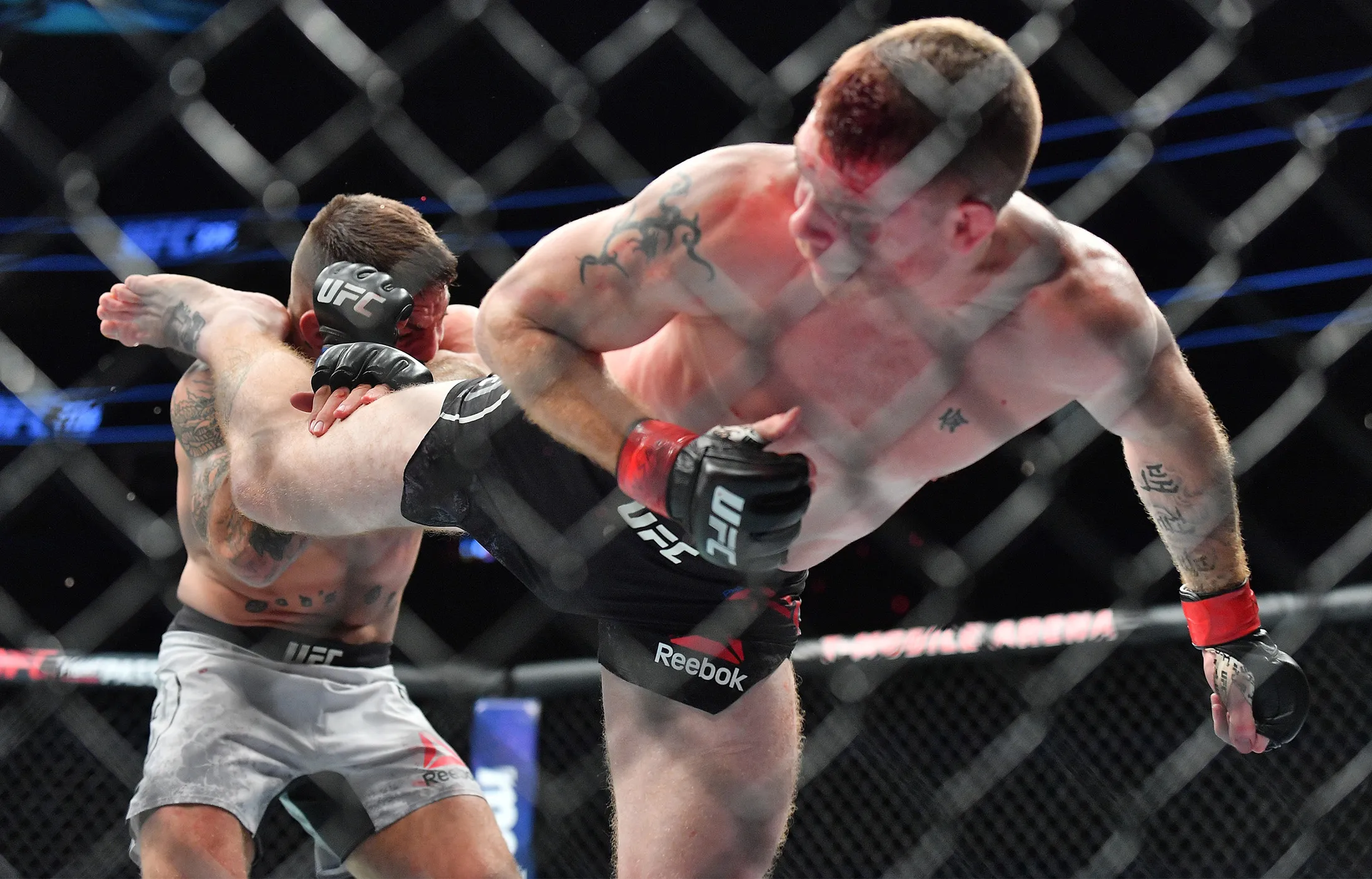 Paul Felder kicks Mike Perry during their welterweight fight at T-Mobile Arena in Las Vegas in 2018.
