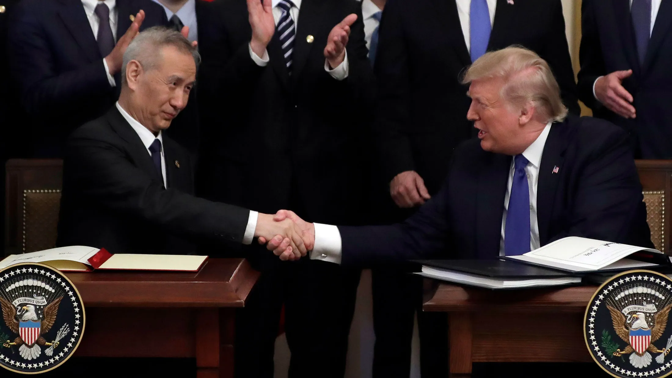 President Donald Trump with Chinese Vice Premier Liu He after signing a trade agreement at the White House, on Jan. 15.