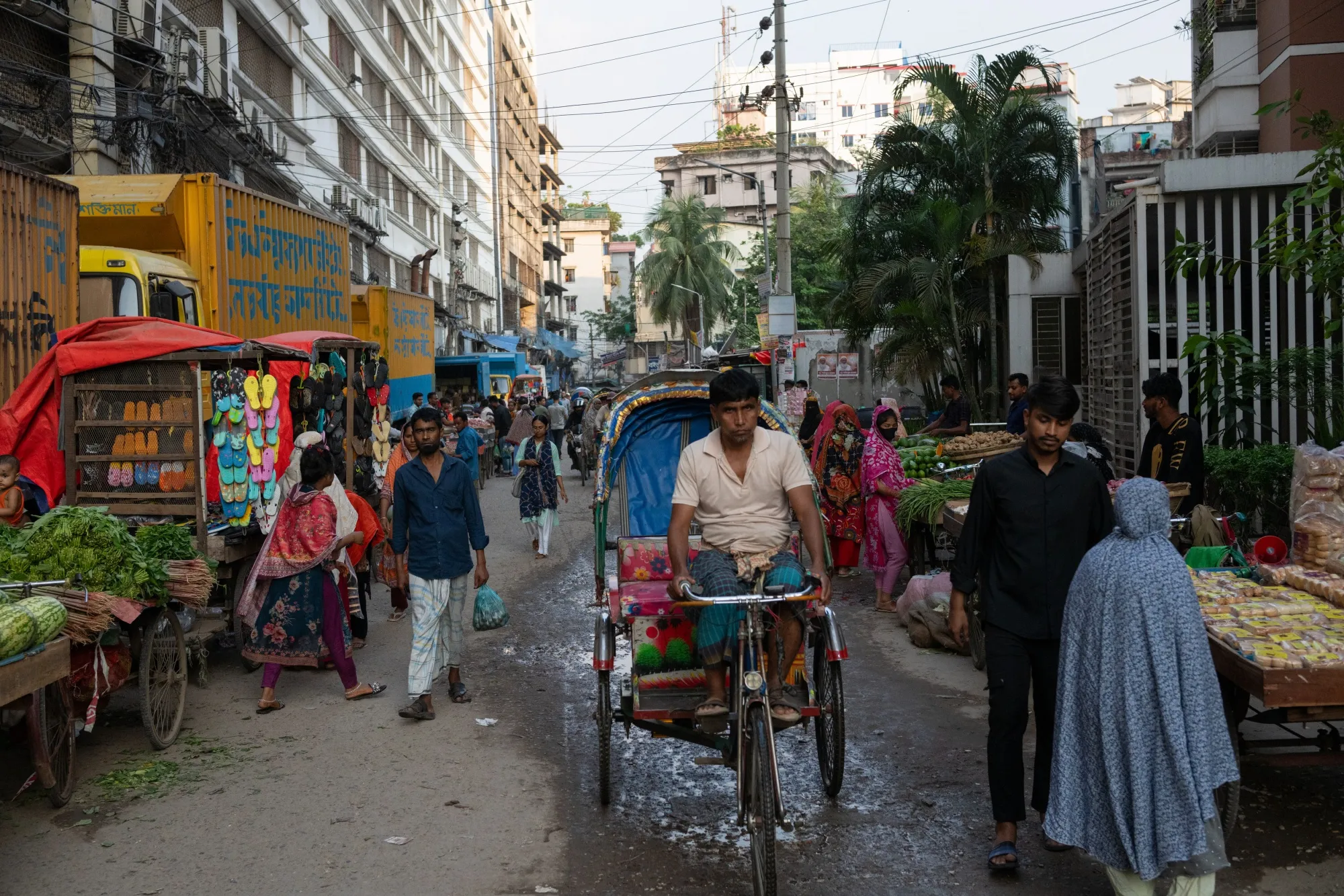 Street vendors sell vegetables in Dhaka, Bangladesh.