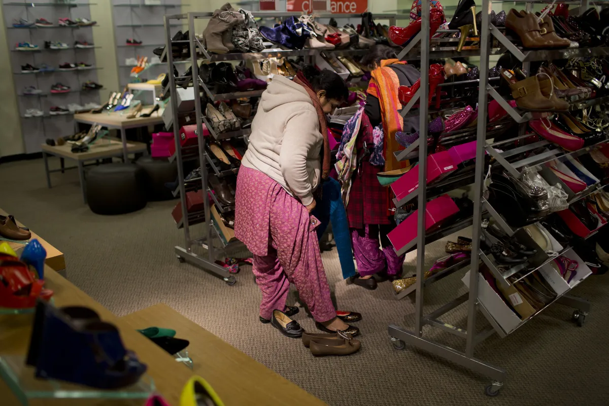 A customer shops for shoes in New York.