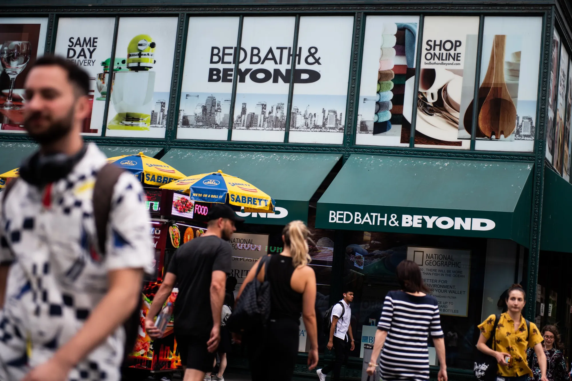 Pedestrians walk past a Bed Bath &amp; Beyond&nbsp;store in New York.