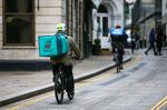 A food delivery courier for Deliveroo in London.
