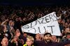 Photo of football funds holding a banner reading Glazers out.