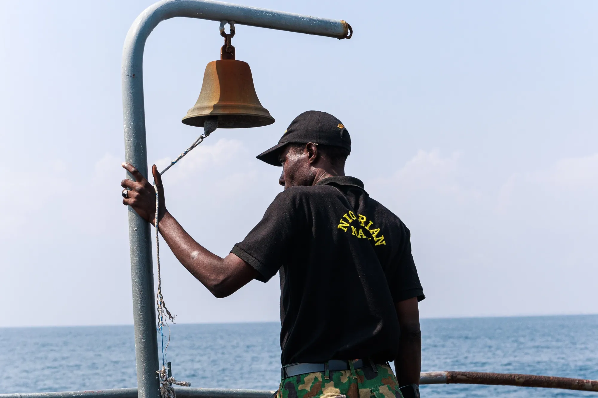 A Nigerian naval officer during a ceremony to mark the first delivery of crude oil to the Dangote Industries Ltd. refinery in Nigeria.