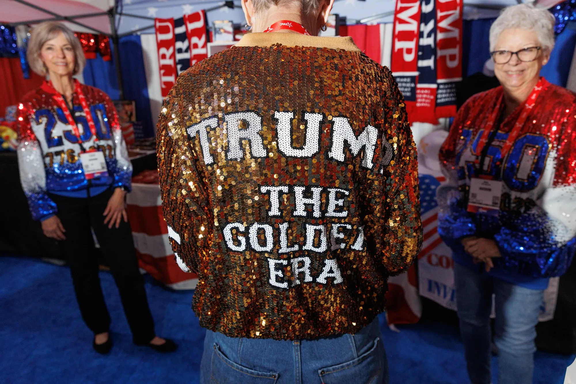 A worker wears a “Trump The Golden Era” jacket during the Conservative Political Action Conference (CPAC) in Grapevine, Texas.