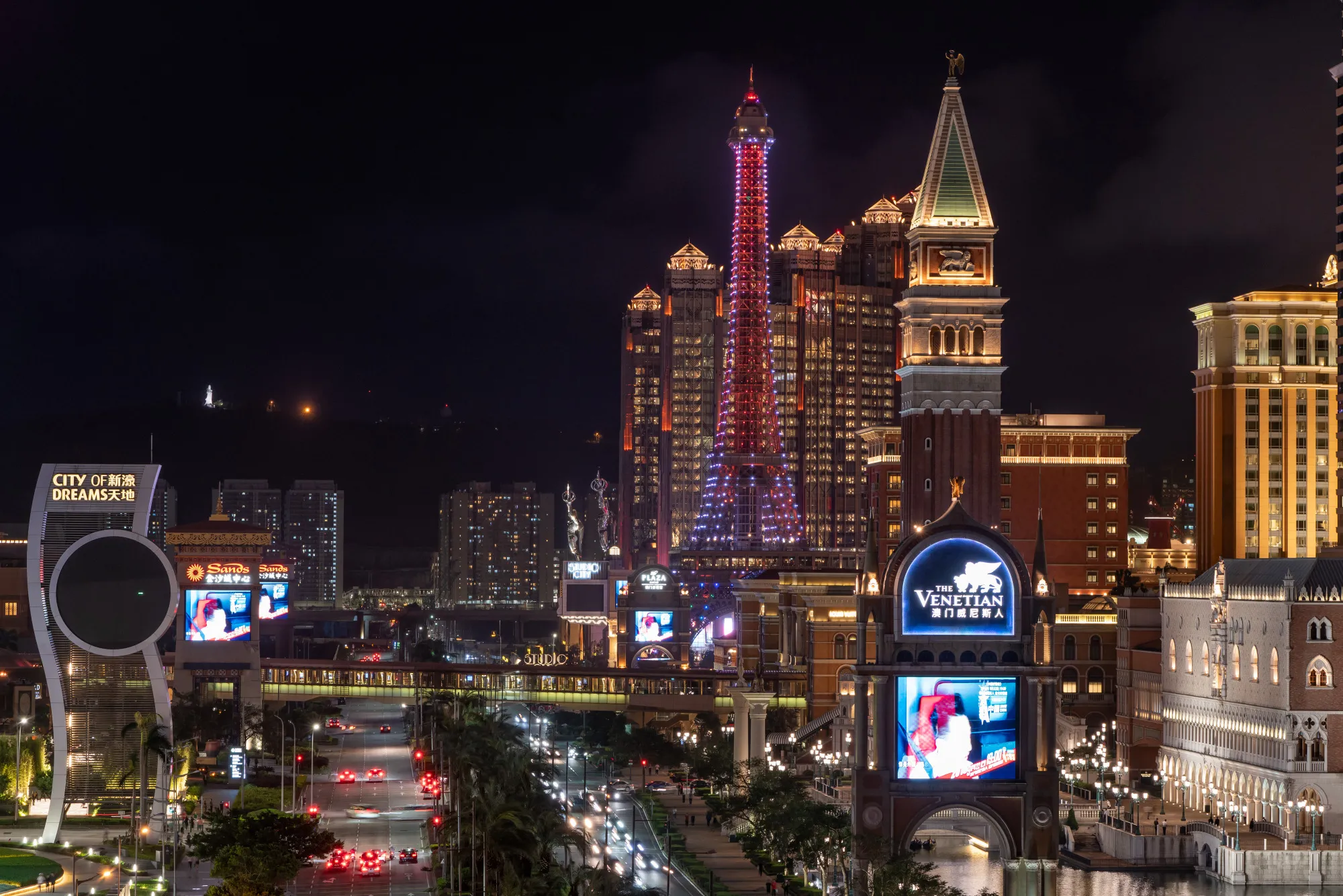 Casinos and hotels stand illuminated at night on the Cotai strip in Macau.