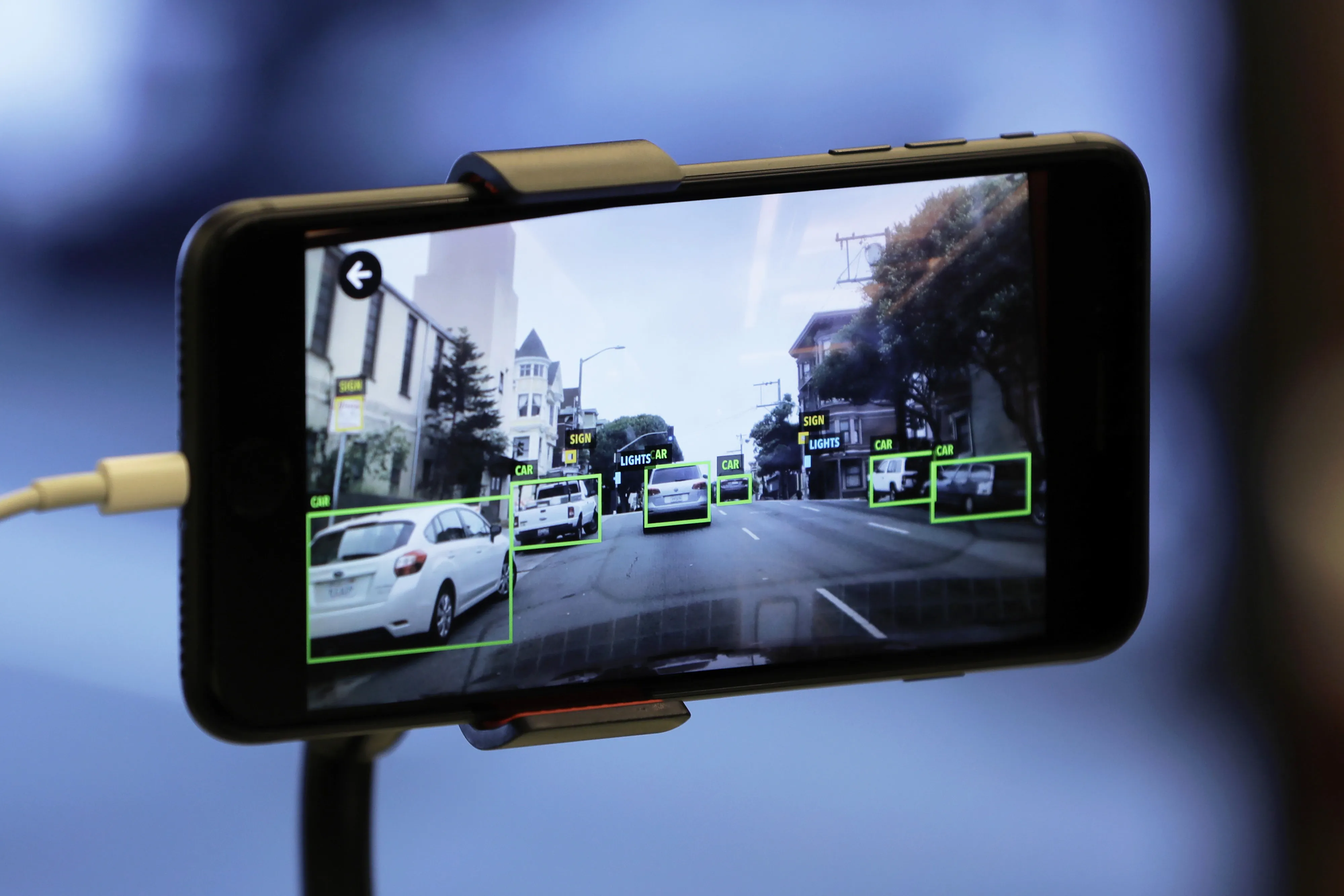 The Mapbox Inc. Vision software development kit is demonstrated on a smartphone at the SoftBank World 2018 event in Tokyo.