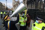 Steve Bray uses a megaphone outside Parliament in London in 2021.