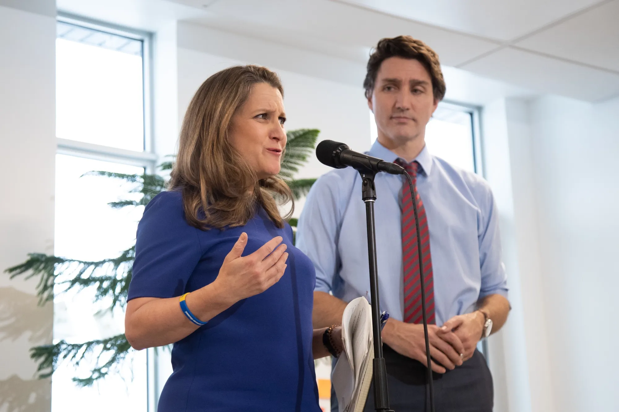 Chrystia Freeland speaks alongside Justin Trudeau in Ottawa on March 29.