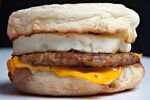 An egg McMuffin with sausage