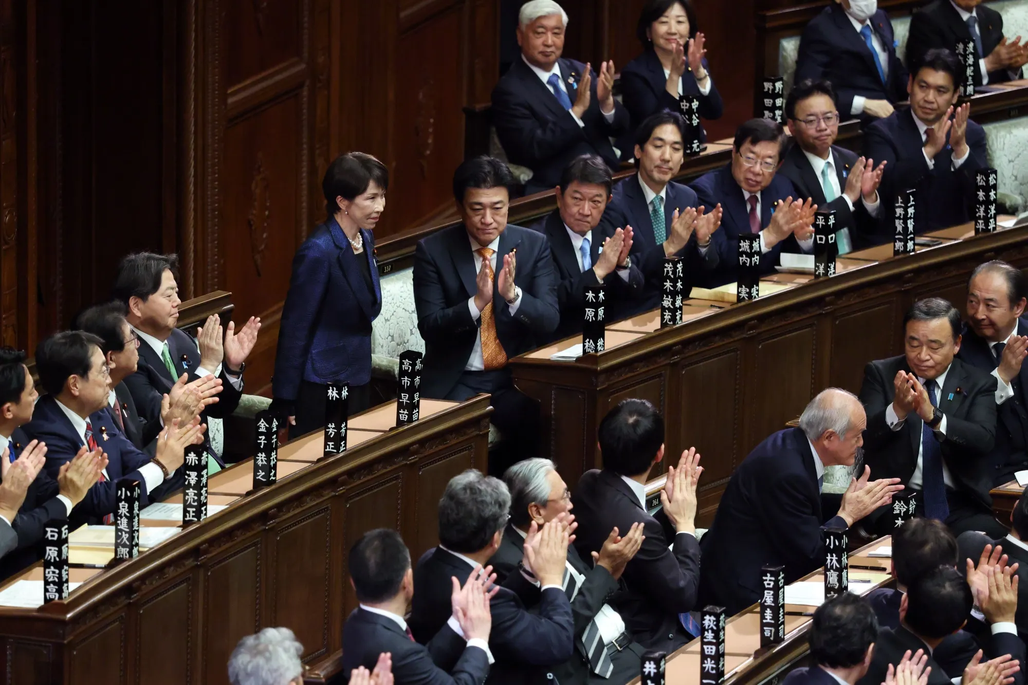 Sanae Takaichi receives applause after being reappointed Prime Minister in the lower house of parliament on Feb. 18.